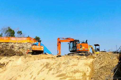 木を伐採する重機