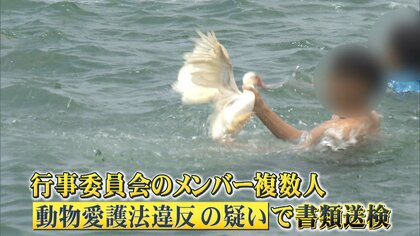 アヒル取り競争　首を掴む